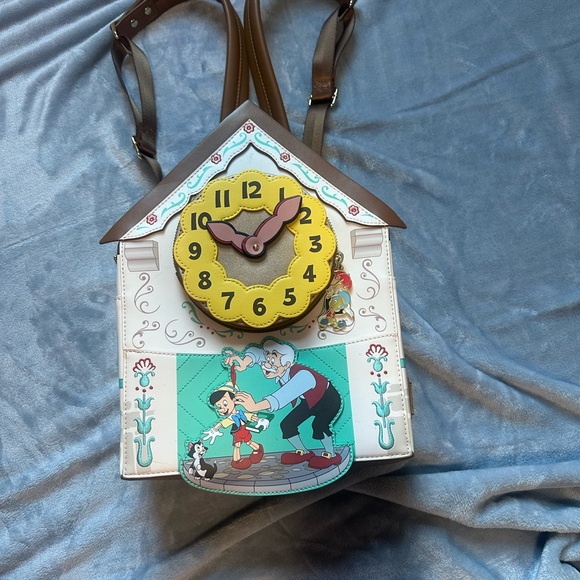 Loungefly Handbags - Loungefly Disney Pinocchio Clock House Mini Backpack